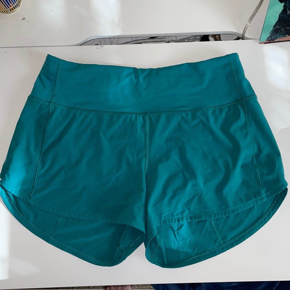 Lululemon shorts, “teal-lagoon” color, size 10, 4” inseam